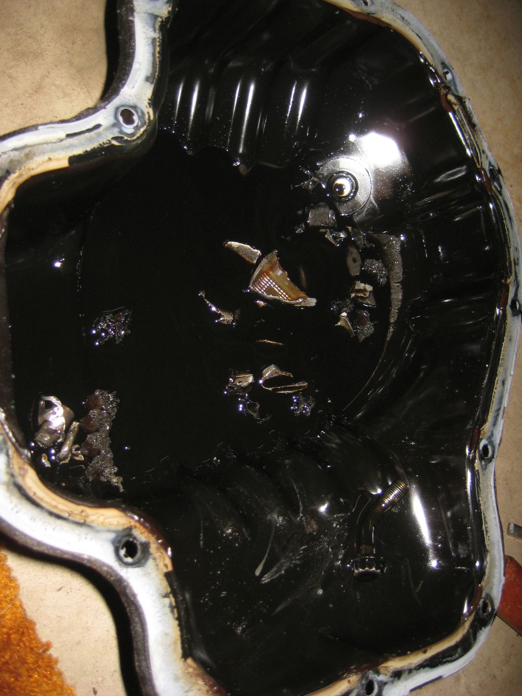 Debris in oil pan.jpg