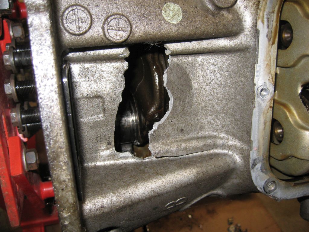 Hole in Upper Oil pan close up.jpg