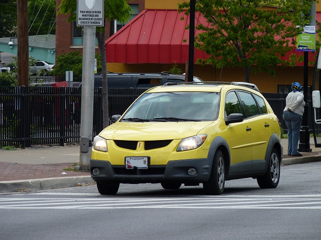 Yellow Pontiac Vibe.JPG