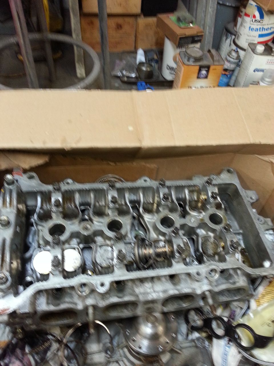 old cylinder head. Machined badly and allowed coolant into chambers. So the rings were replaced again and a rebuilt head with cams was bought and installed.