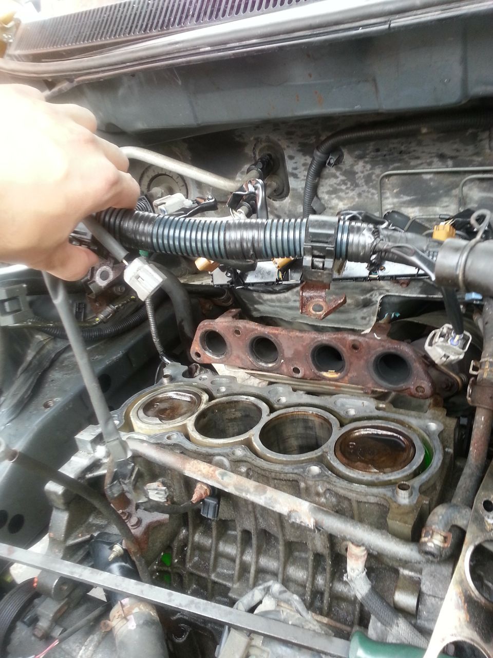 After engine was rebuilt. Head had to be replaced and rings changed again