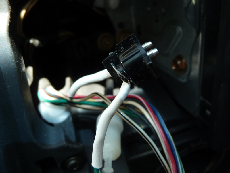 The male part of the switch harness spliced in