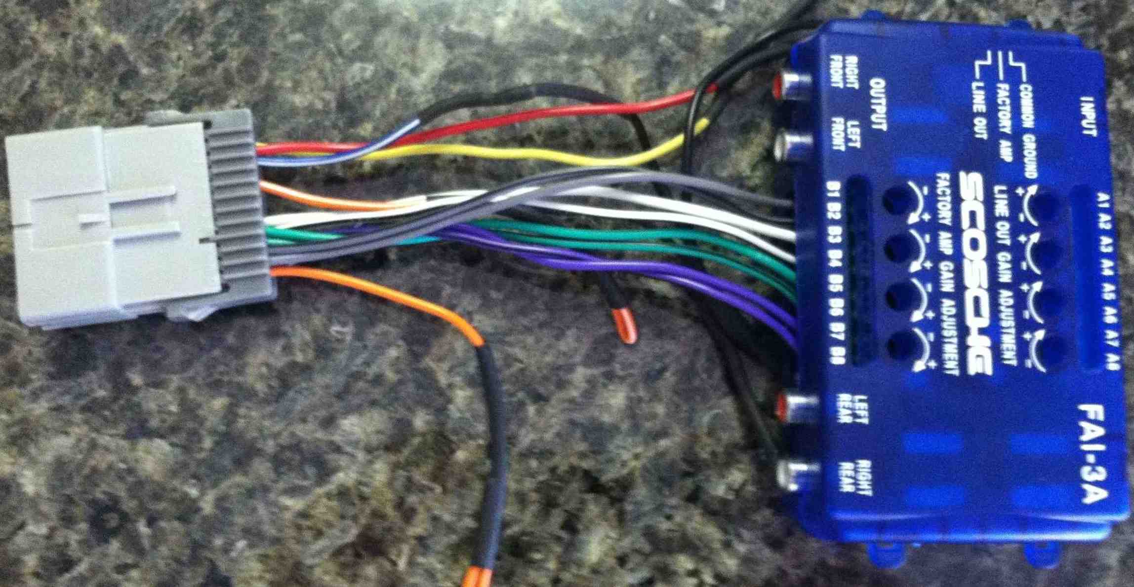 Old setup with connector to car harness and blue Scosche box