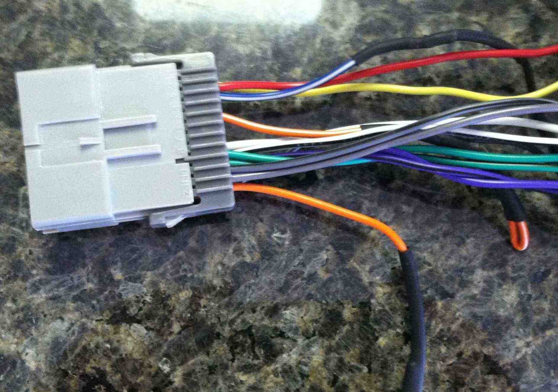 New setup which uses no blue box. The connector to car harness was soldered directly to head unit harness.