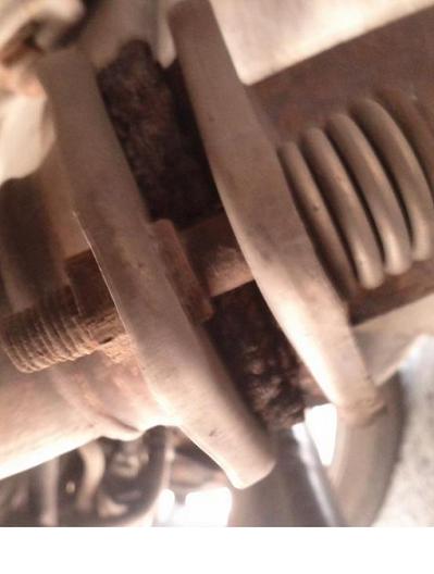 I think this could be the culprit, its very worn out (located right side by the rear wheel)