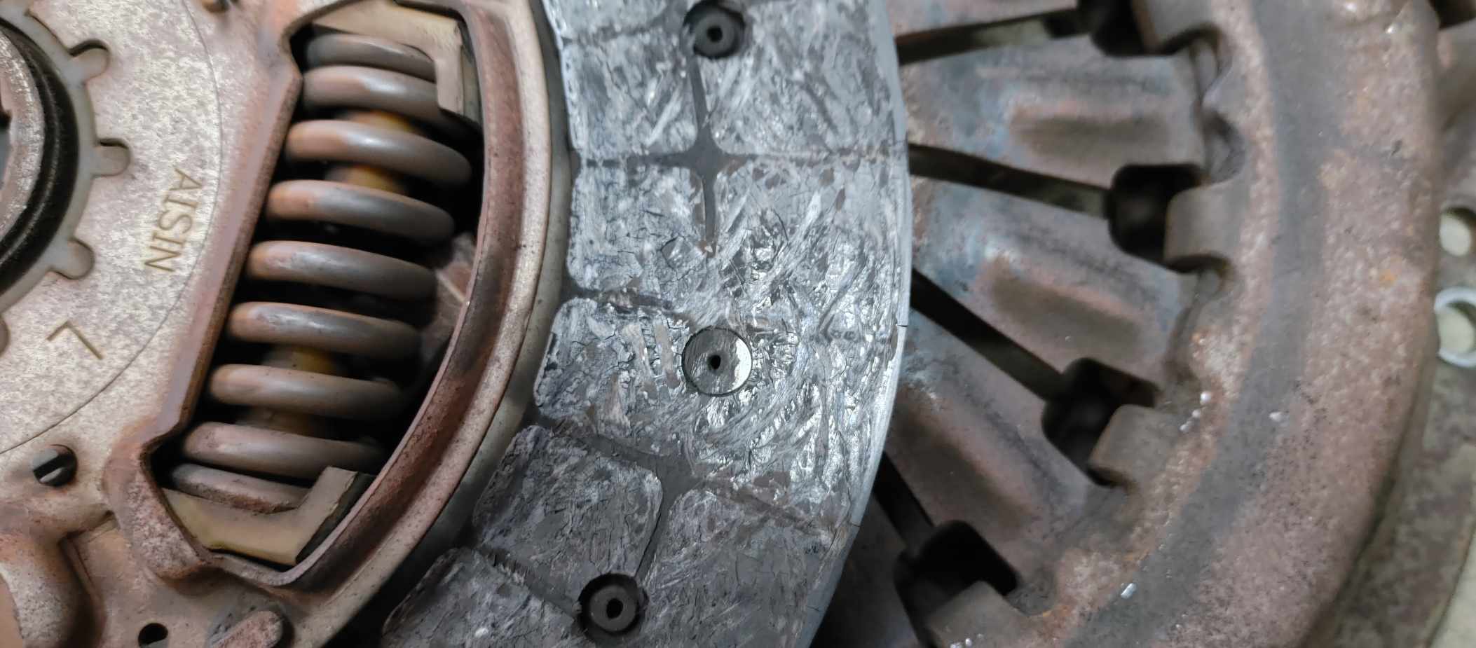 Here you can see my original clutch disk it was worn down to the rivets.