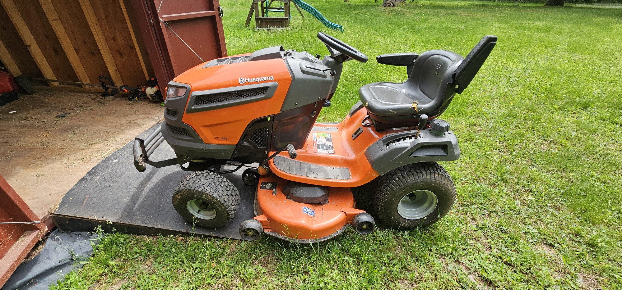 Those armrests are custom.  Theyre included with higher level husqvarna garden tractors and stuff.  They can also attach to this tractors seat so I ordered those for it.