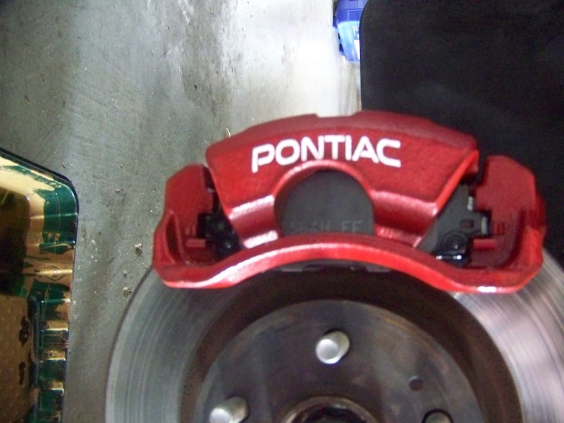 Painted calipers red and add PONTIAC